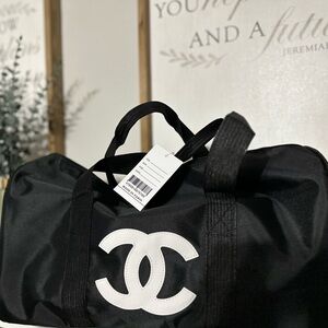 CHANEL Black Duffel Bag with White Logo